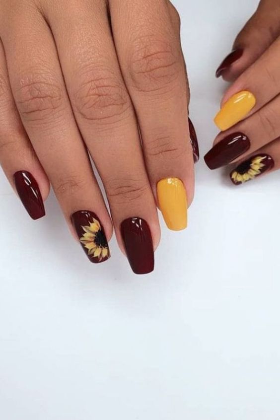 Nail đỏ rượu với họa tiết hướng dương